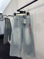 Balenciaga Embroidered Denim Pants With Red Lettering