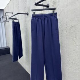 Gucci Embossed Logo Trousers