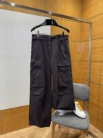 Prada Distressed Triangle Logo Pants